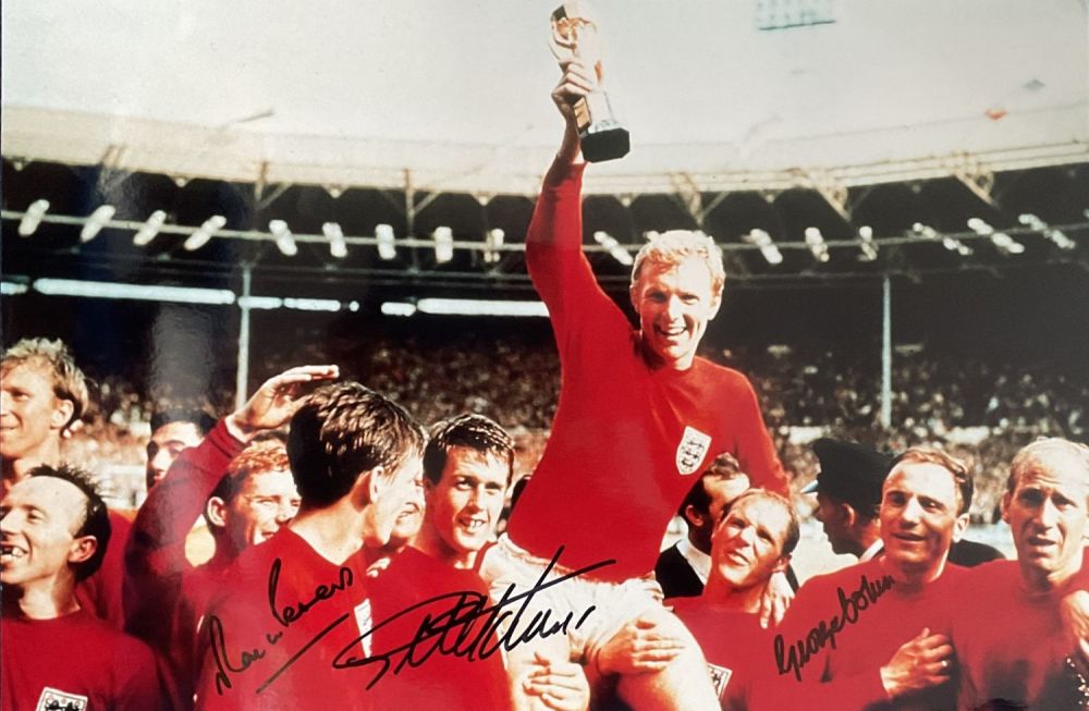 Lot 681: Geoff Hurst, Martin Peters and George Cohen Signed...