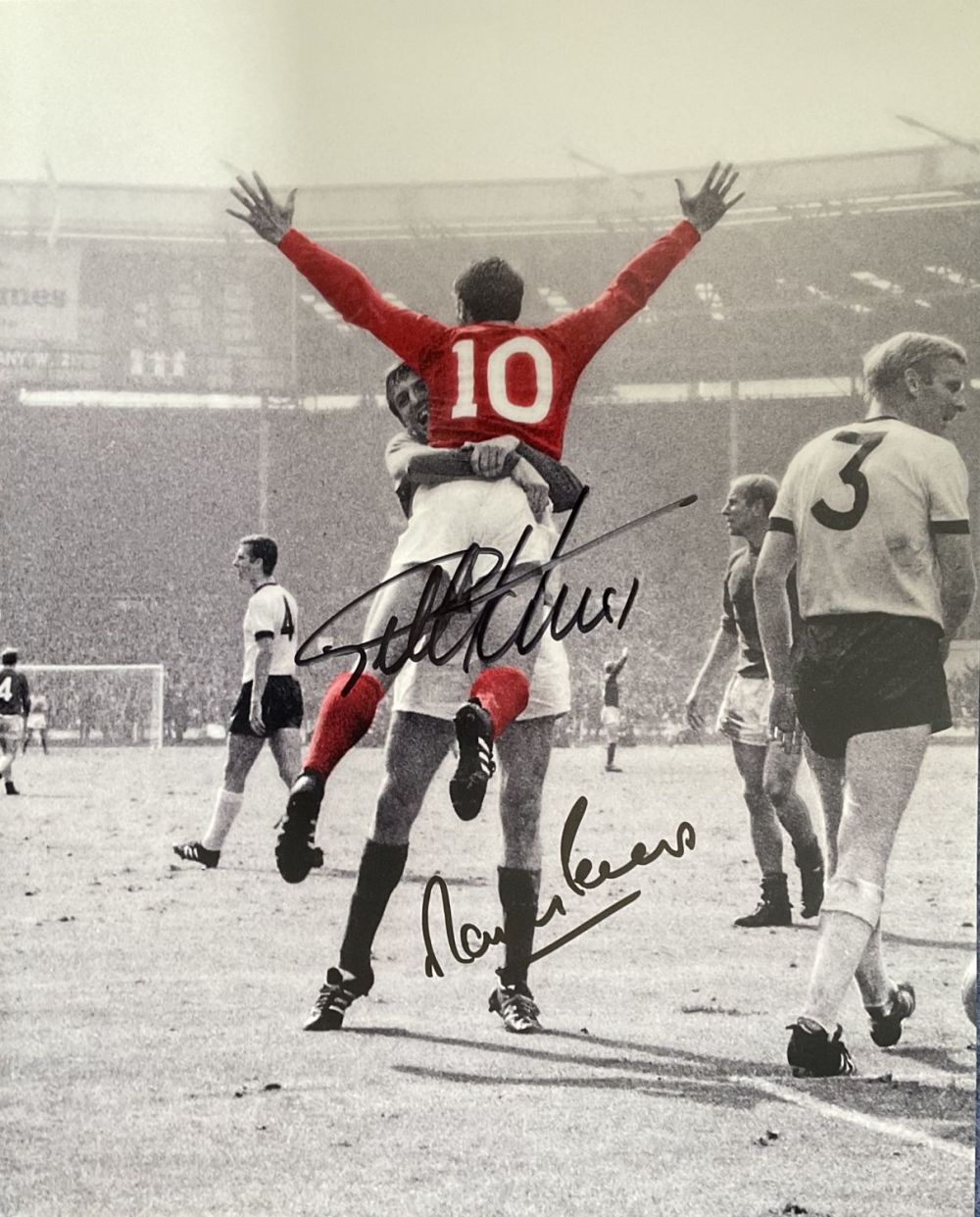 Lot 684: Geoff Hurst and Martin Peters Signed 20x16 inch...