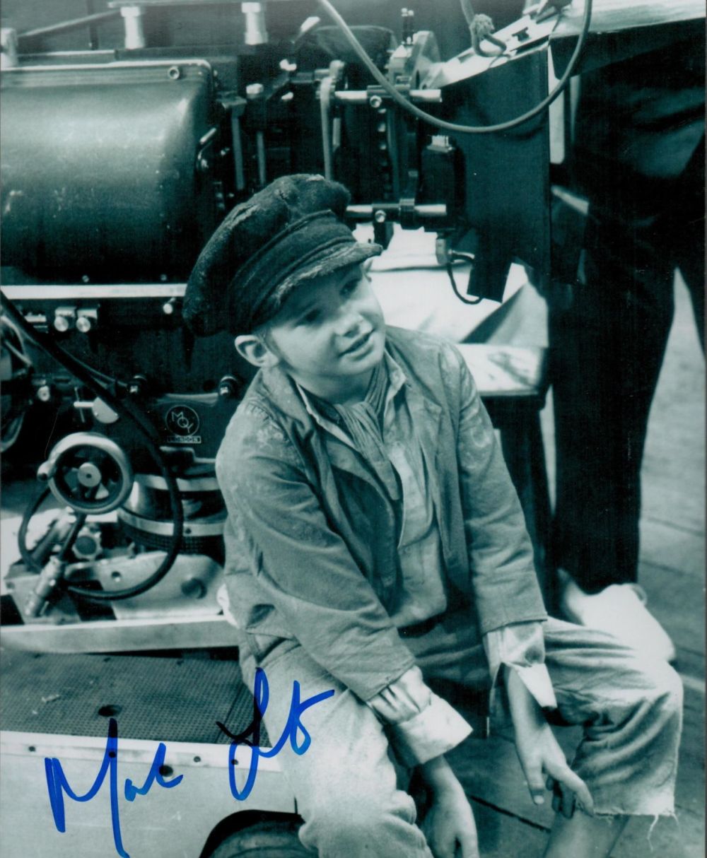Lot 81: Mark Lester signed Oliver 10x8 black and white...