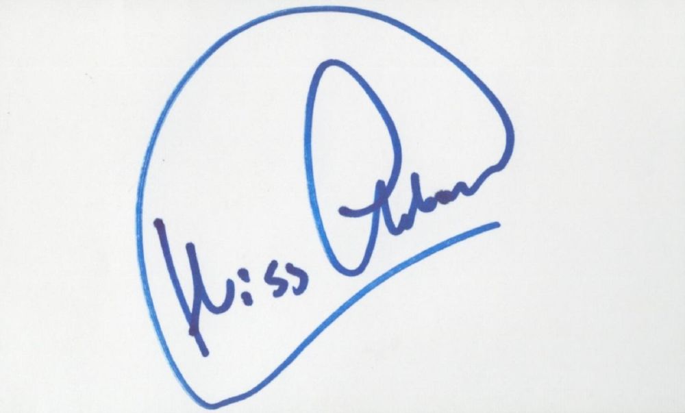 Lot 164: Kriss Akabusi white card (measuring 5"x3") nicely signed...
