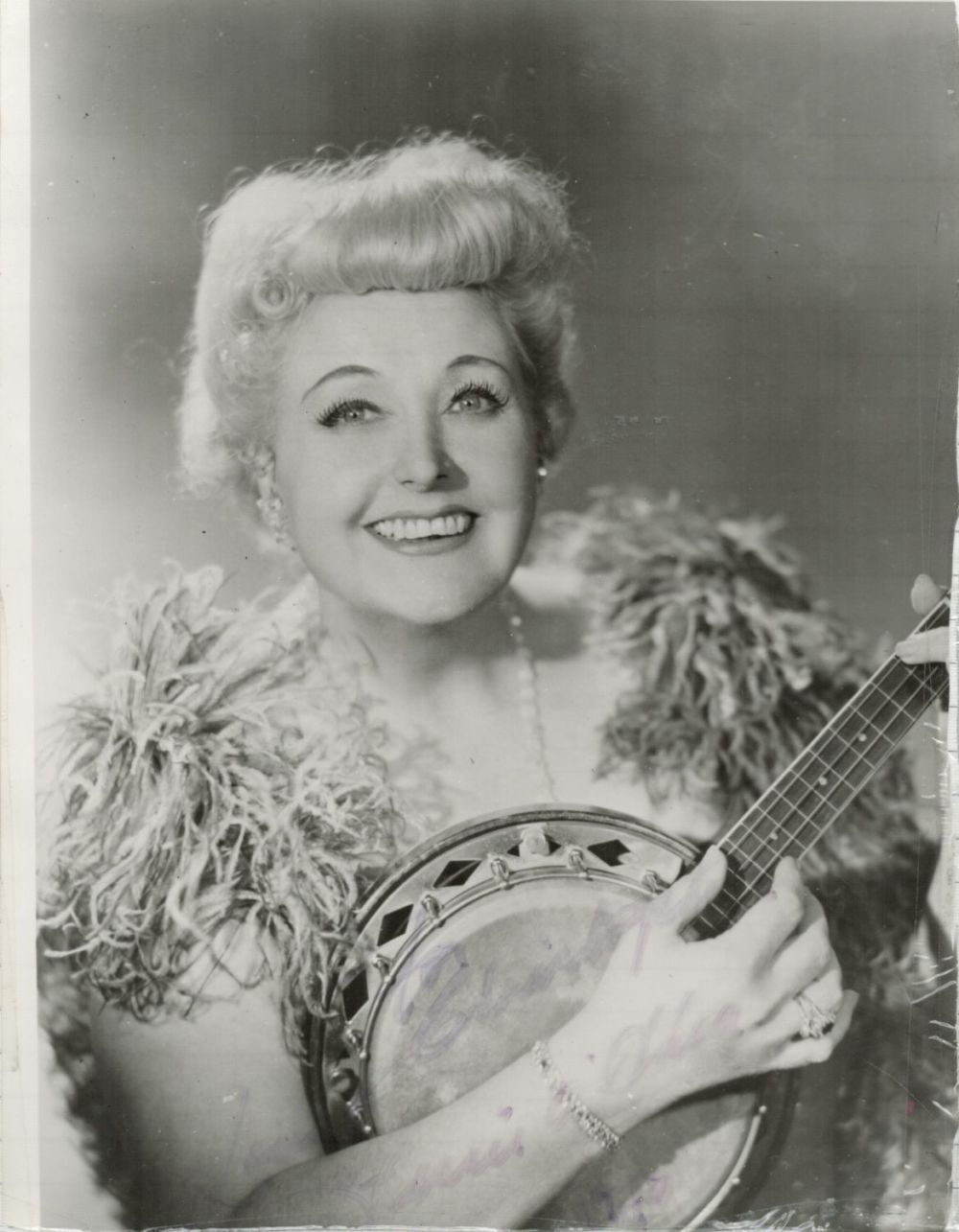 Lot 237: Tessie O'Shea signed 9x7 black and white photo....