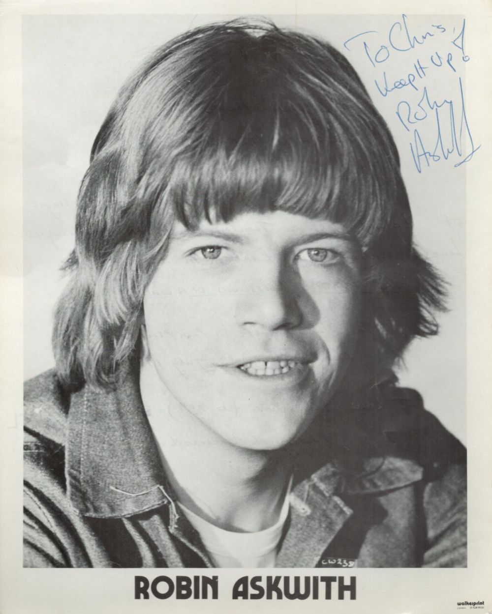 Lot 252: Robin Askwith signed 10x8 black and white photo....