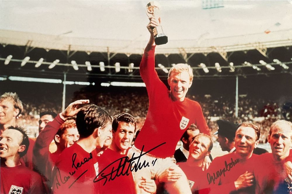Lot 199: Geoff Hurst, Martin Peters and George Cohen signed...