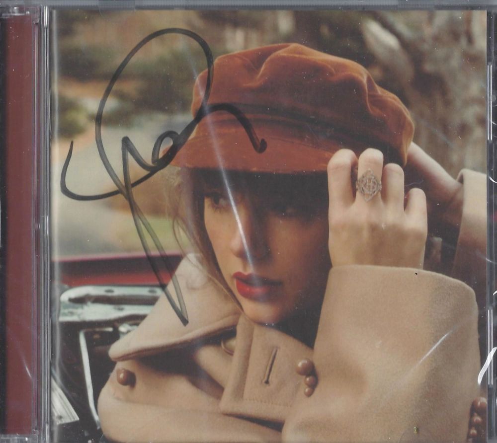 Lot 324: Music, Taylor Swift signed CD sleeve for the...