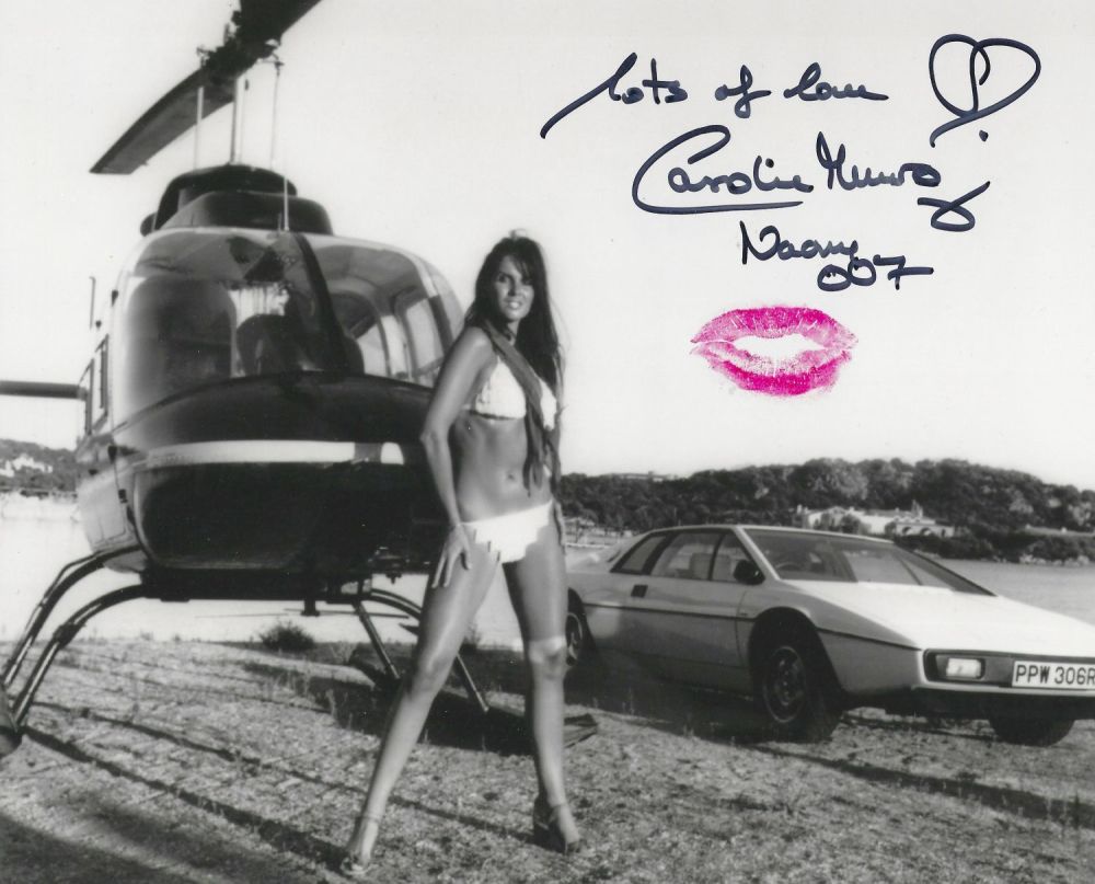 Lot 55: Caroline Munro signed and kissed 10x8 black and...