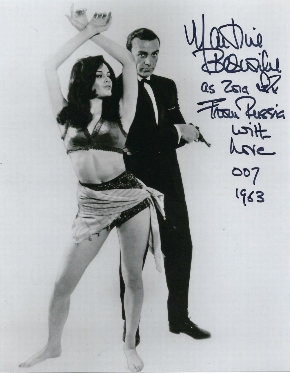 Lot 61: Martine Beswick signed 10x8 black and white photograph...