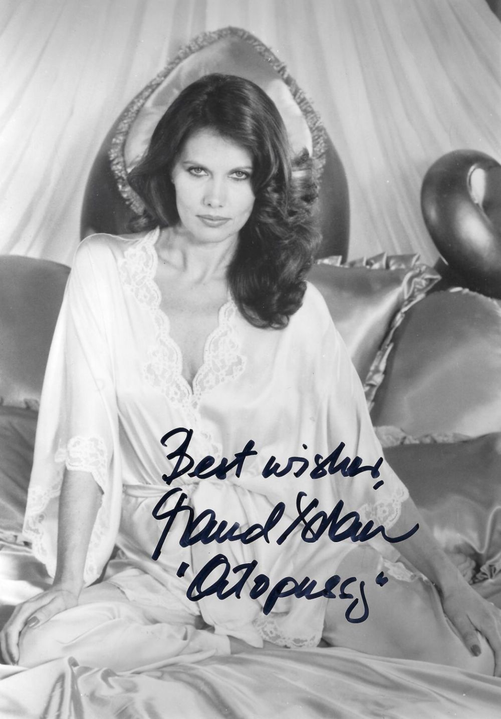 Lot 68: Maud Adams signed 10x8 black and white photograph...