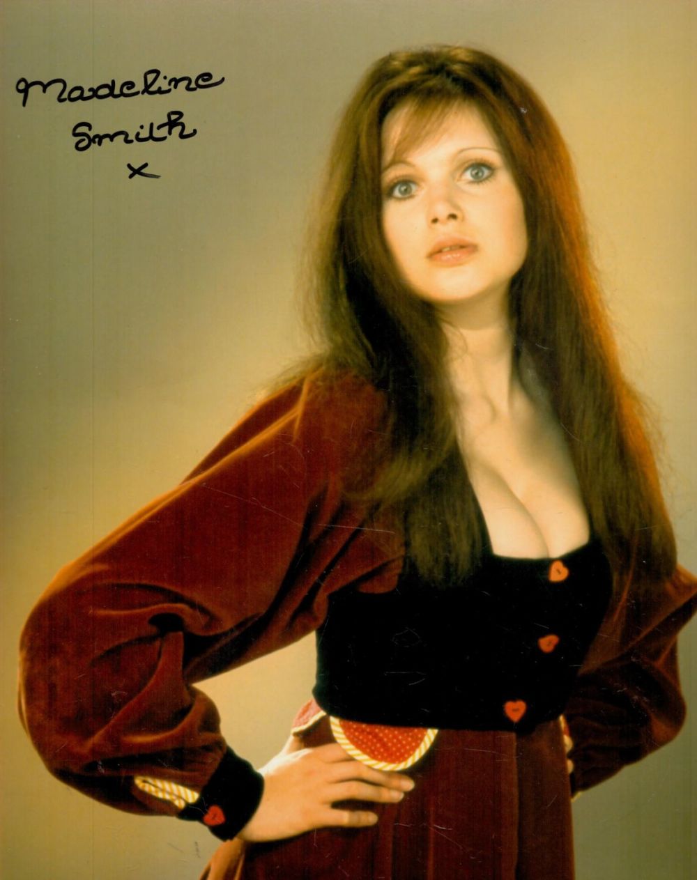 Lot 212: Madeline Smith signed 10x8 sexy busty colour photograph...