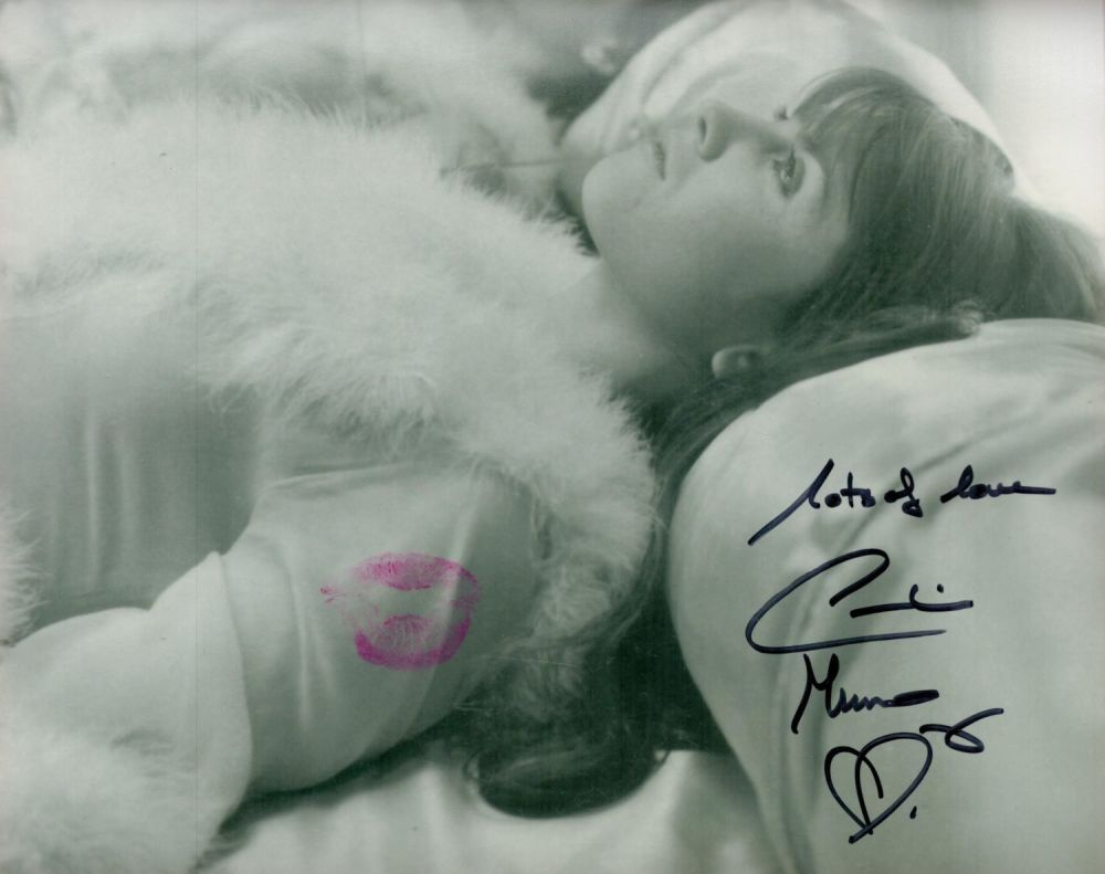 Lot 222: Caroline Munro signed 10 x 8 inch b/w...