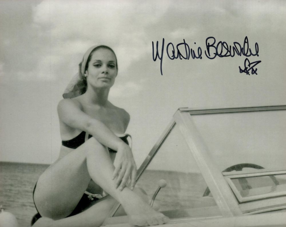Lot 239: Martine Beswick signed 10 x 8 inch b/w...
