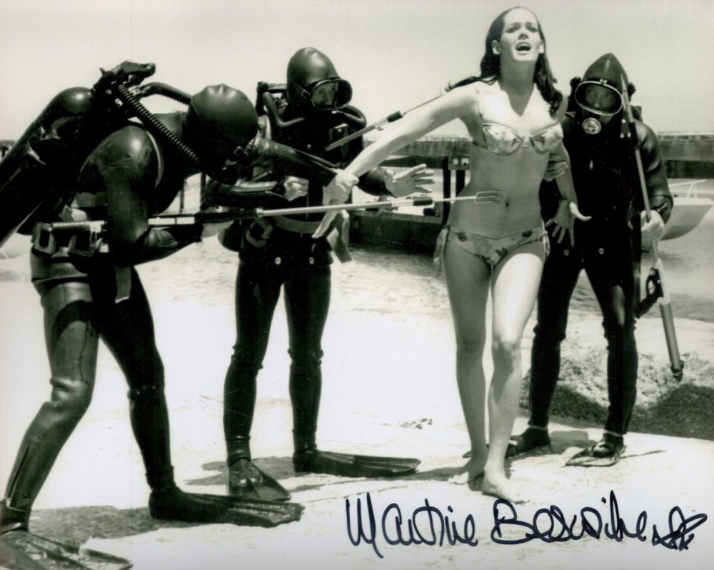 Lot 242: Martine Beswick signed 10 x 8 inch b/w...