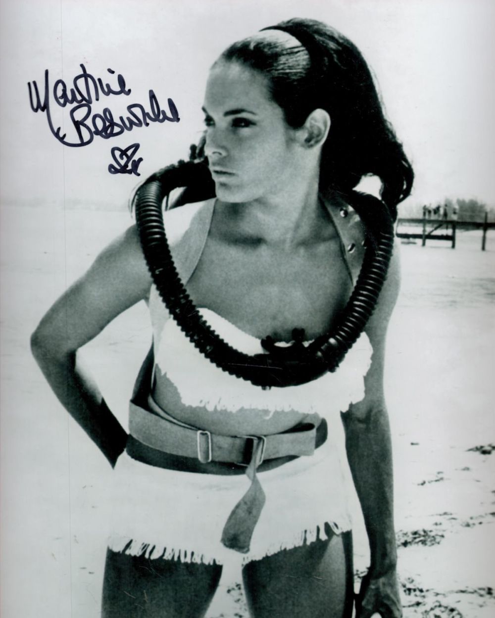 Lot 243: Martine Beswick signed 10 x 8 inch b/w...