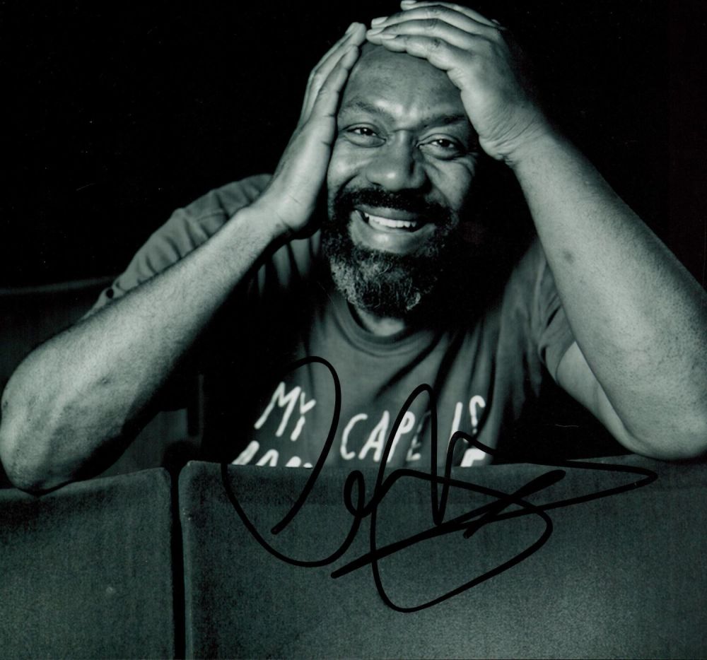 Lot 307: Lenny Henry signed 10x8 black and white photo....