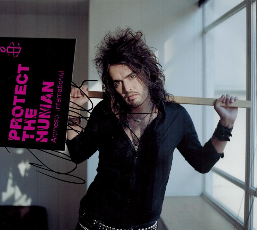 Lot 309: Russell Brand signed 10x8 colour photo. Good condition....