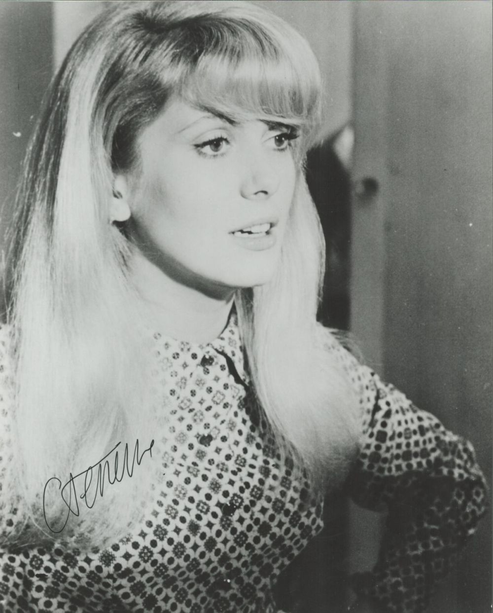 Lot 409: Catherine Deneuve signed 10x8 black and white photo....
