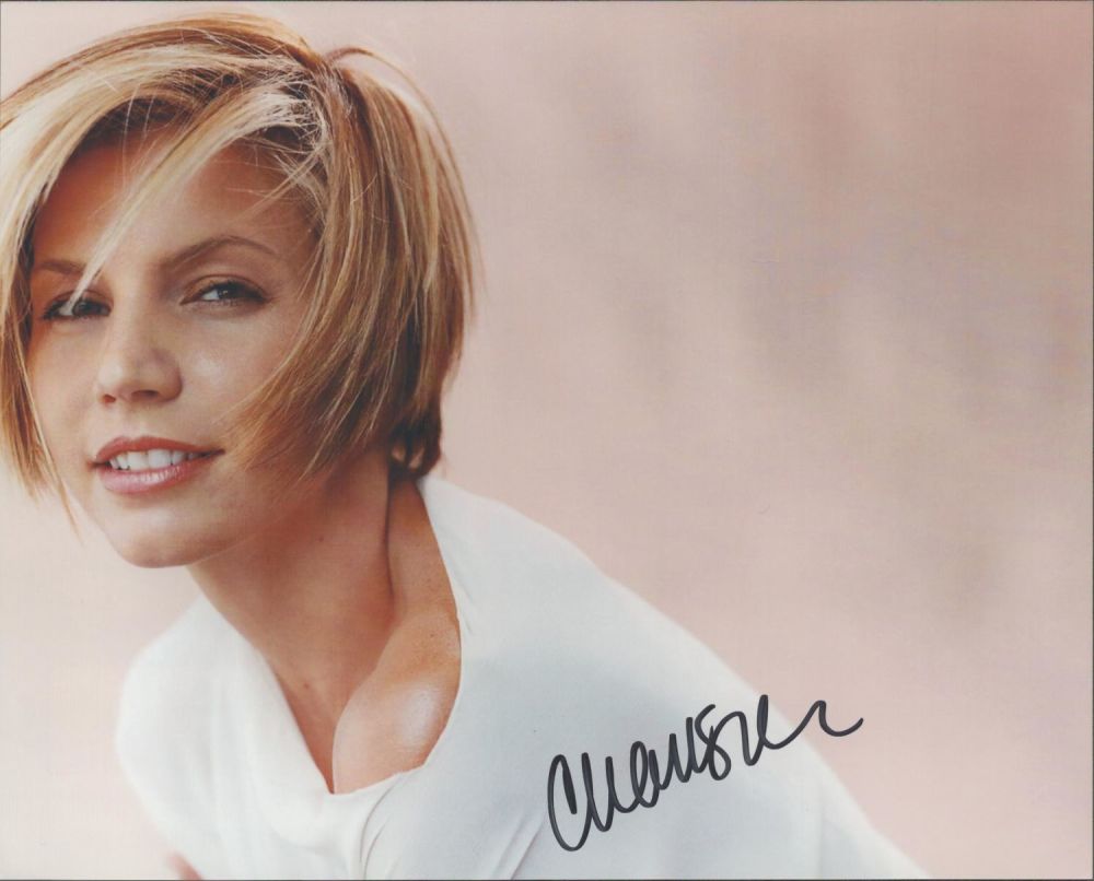 Lot 426: Charisma Carpenter signed 10x8 colour photo. Good condition....