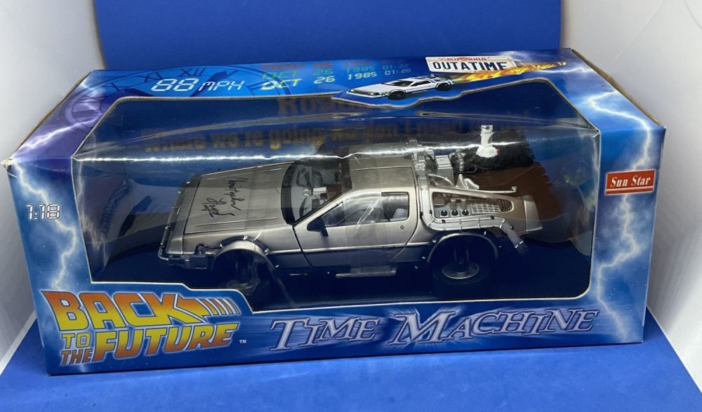 Lot 176: Christopher Lloyd signed Back to the Future 1....