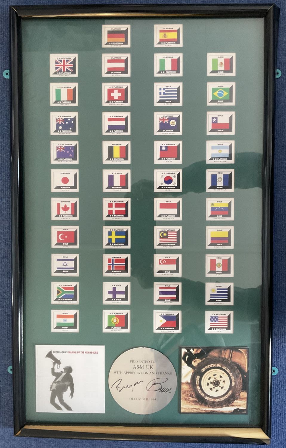 Lot 250: Bryan Adams 31x18 framed and mounted signature piece...