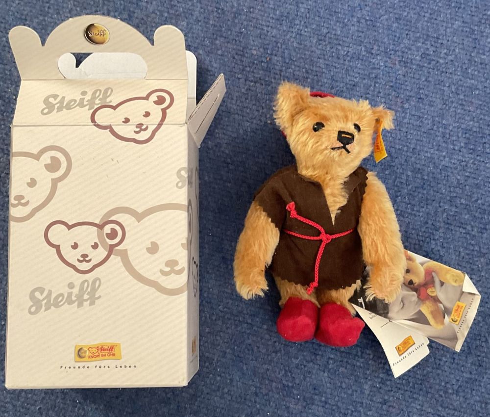 Lot 506: Steiff Classic Teddy Bear 2002 With red hat...