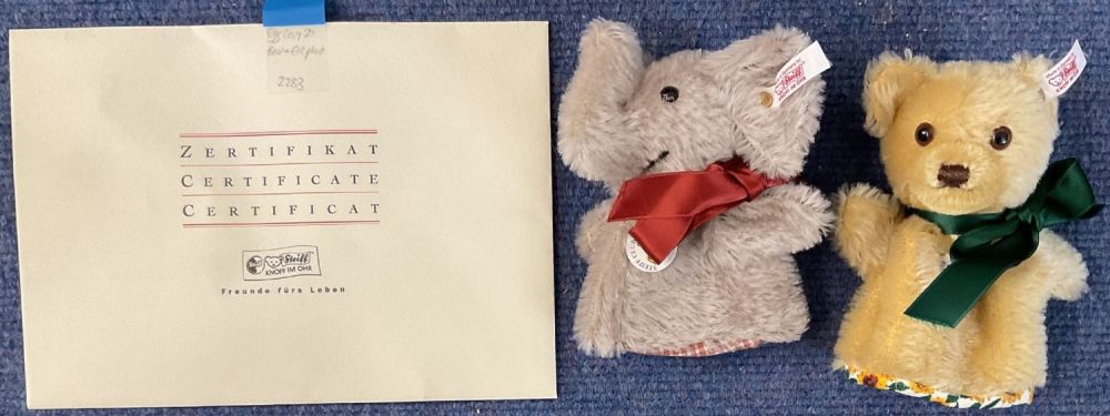 Lot 521: Steiff Egg Cosy Set, Bear and Elephant, 12cm....