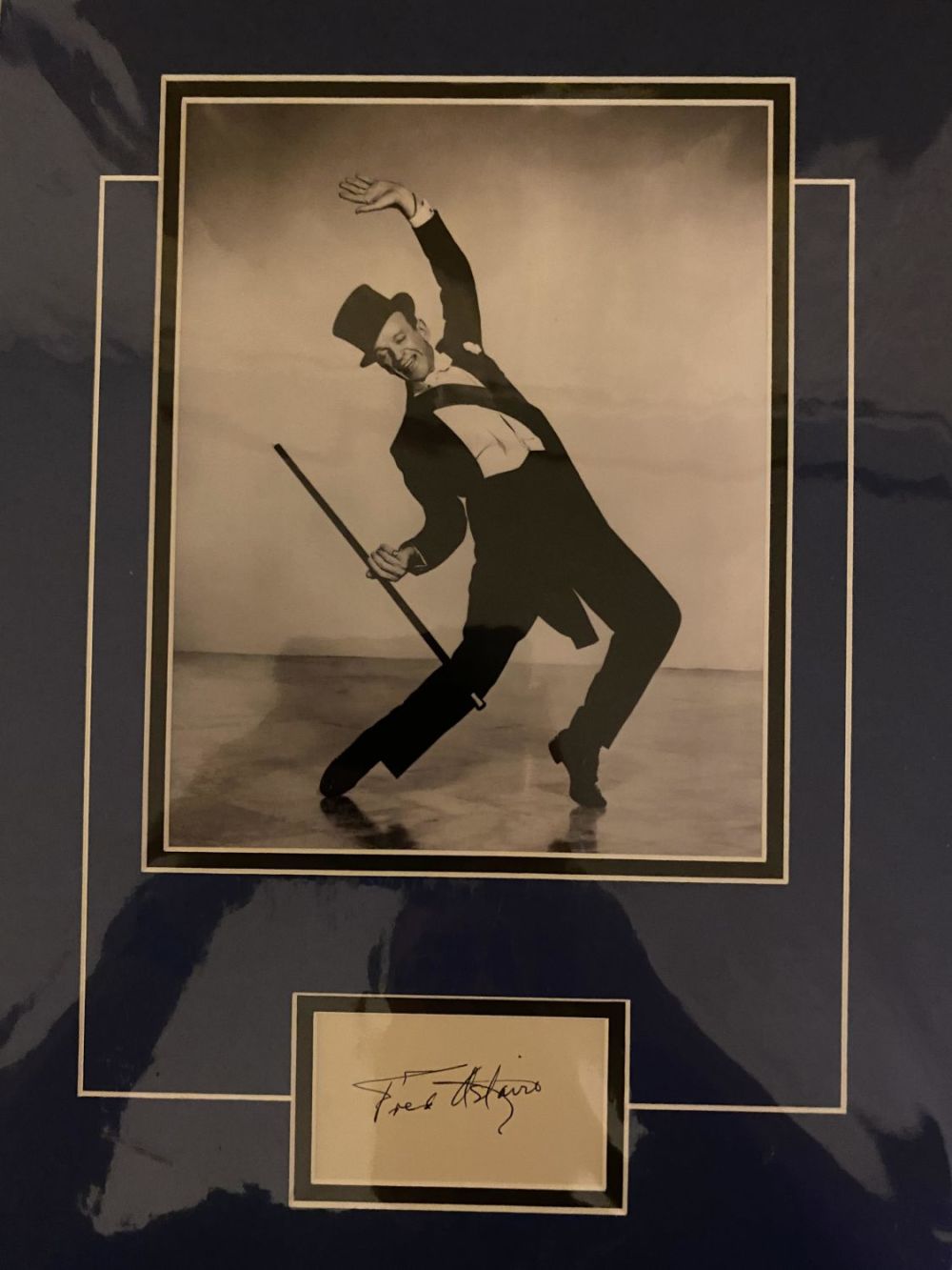 Lot 580: Fred Astaire. Amazing autograph, professionally double mounted below...