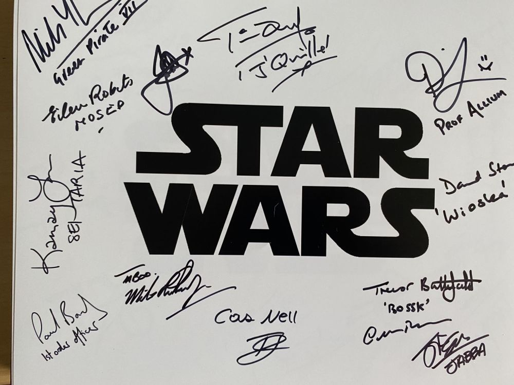 Lot 585: Star Wars 14x11 inch logo photo signed by...