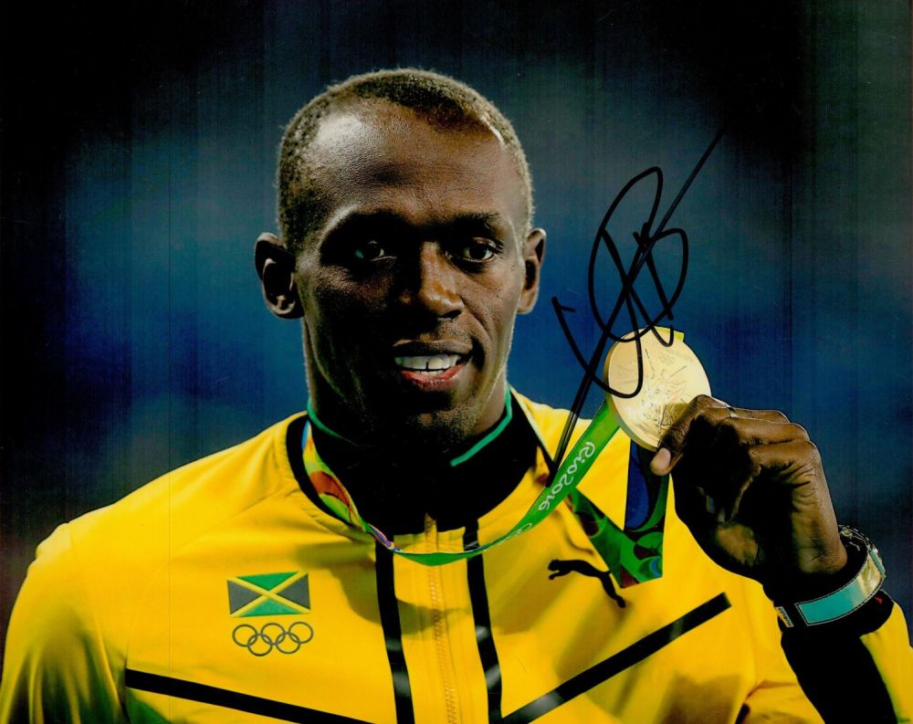Lot 164: Usain Bolt signed 10 x 8 inch colour...