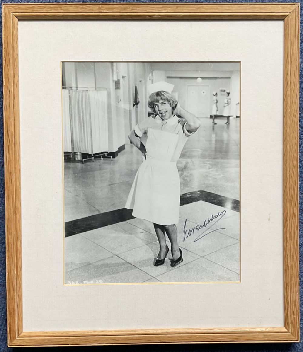 Lot 254: Norman Wisdom Signed Humorous Black and White Photo....