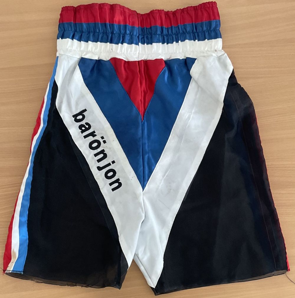Lot 51: Boxing Ryan Rhodes match worn boxing shorts. Ryan...