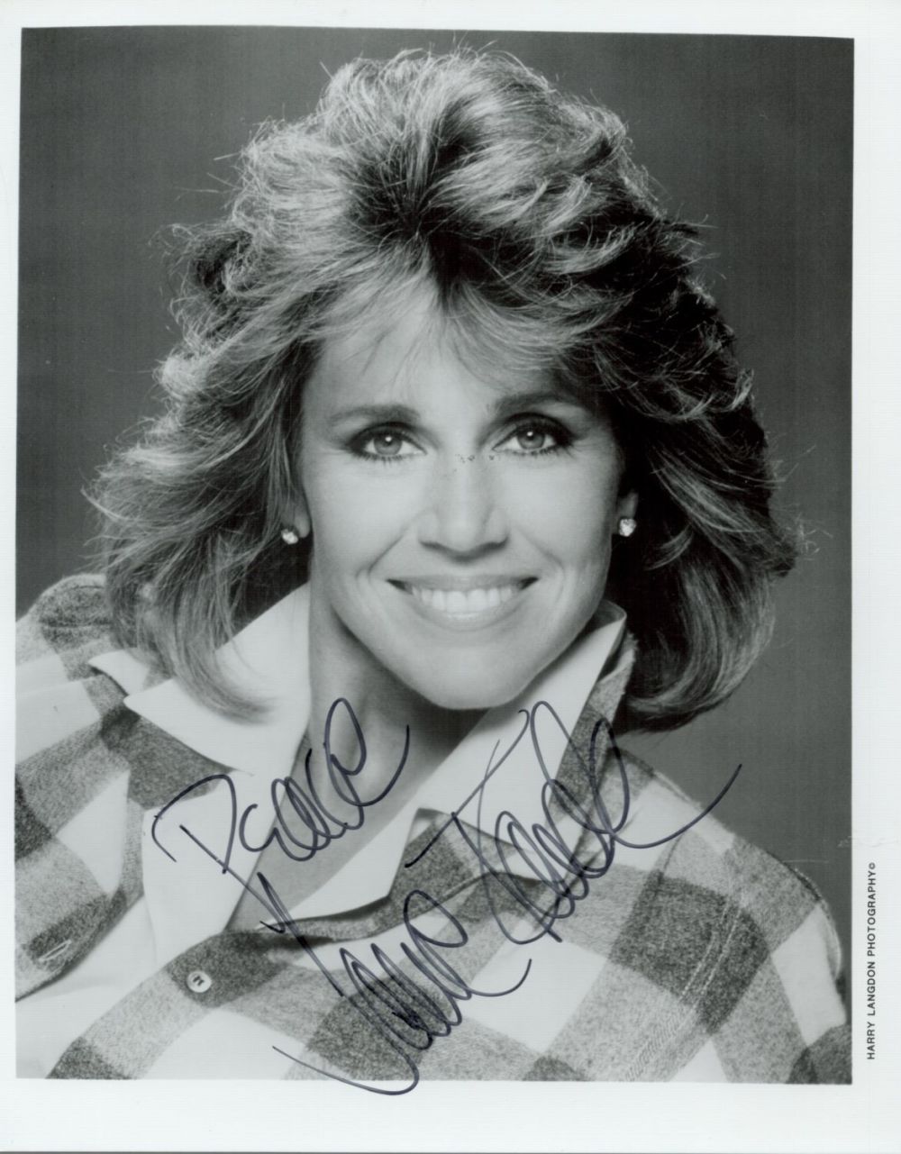 Lot 105: Jane Fonda signed 10x8 black and white photo....