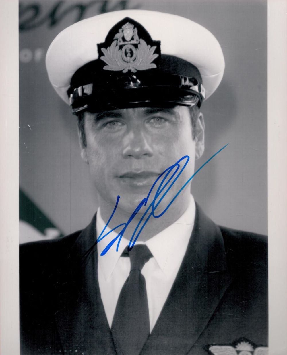 Lot 416: John Travolta signed 10x8 black and white photo....