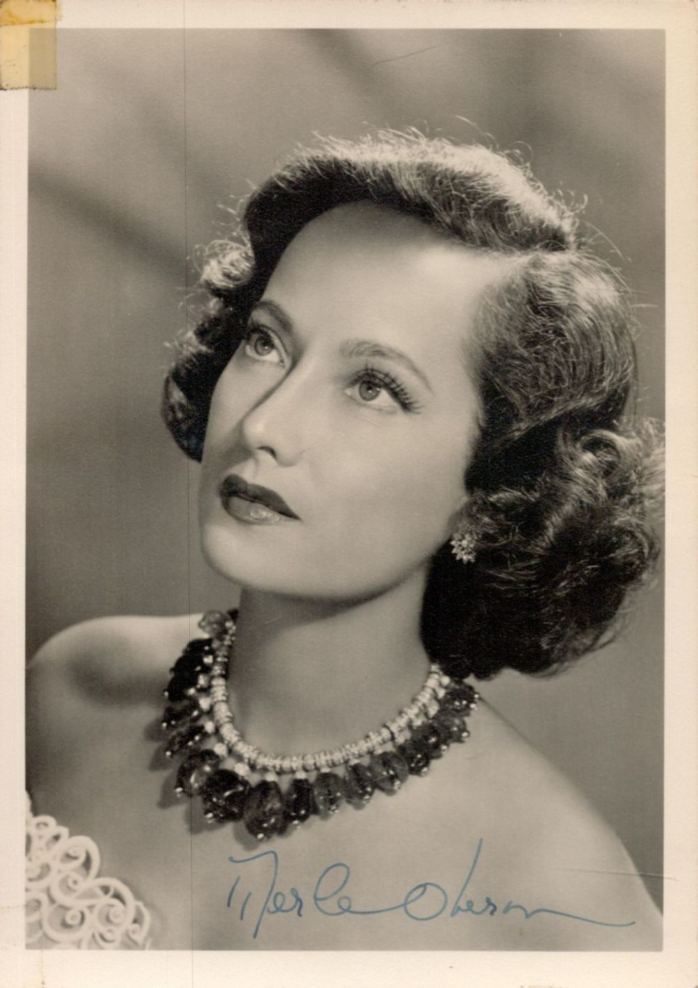 Lot 565: Merle Oberon signed 7x5 vintage black and white...