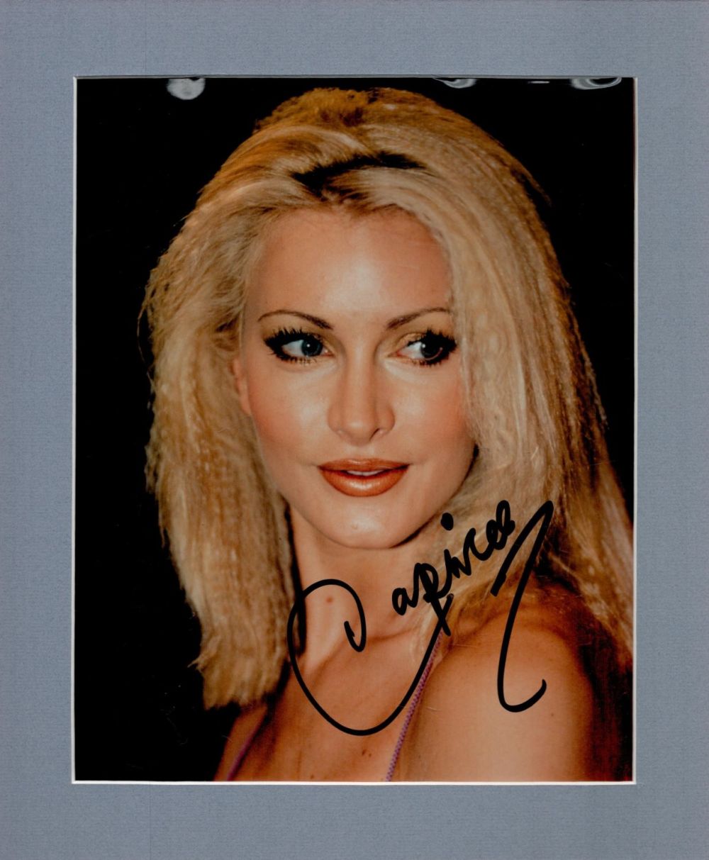 Lot 234: Caprice signed 12x10 overall mounted colour photo. Good...