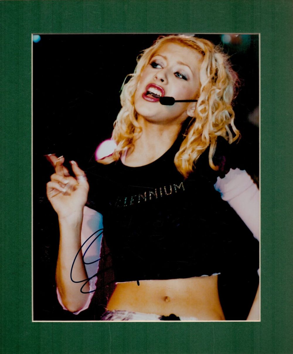 Lot 243: Christina Aguilera signed 12x10 overall mounted colour photo....