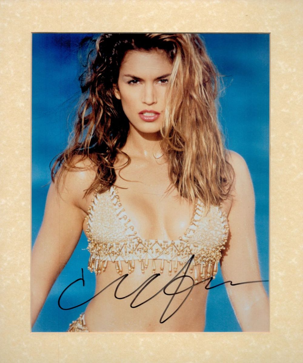 Lot 245: Cindy Crawford signed 12x10 overall mounted colour photo....