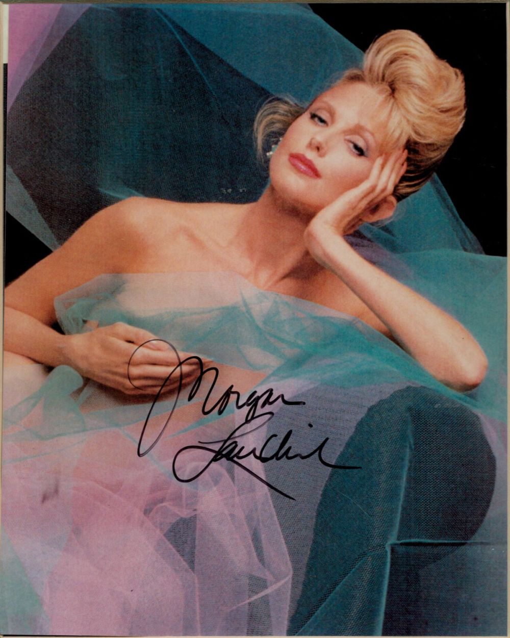 Lot 252: Morgan Fairchild signed 12x8 overall mounted colour photo....