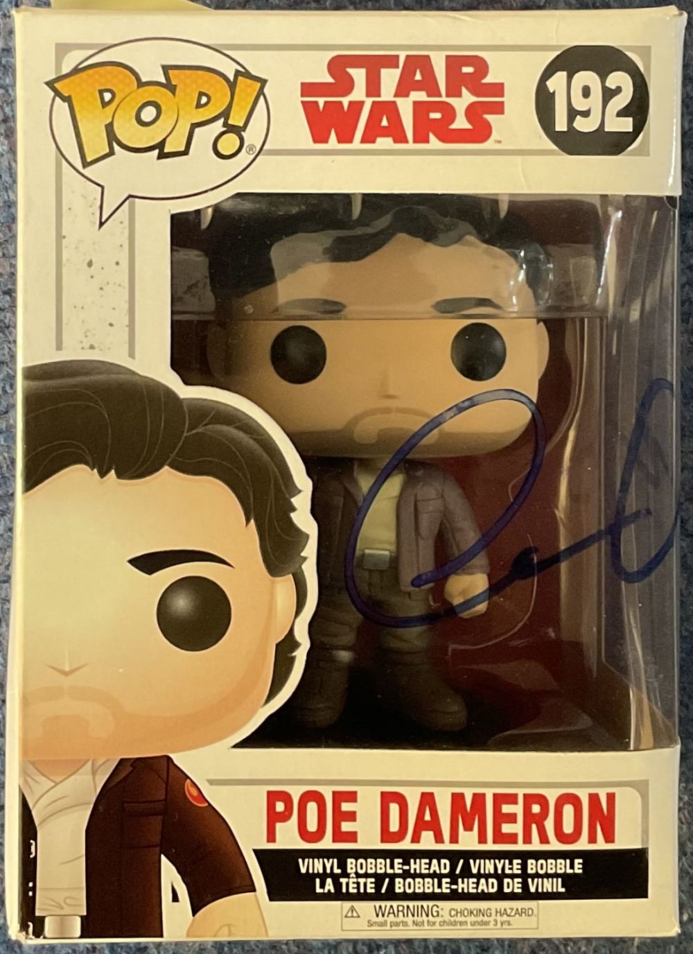 Lot 154: Oscar Isaac signed Poe Dameron Star Wars Vinyl...