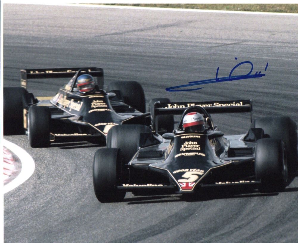 Lot 390: Mario Andretti signed 10x8 picture racing in F1...