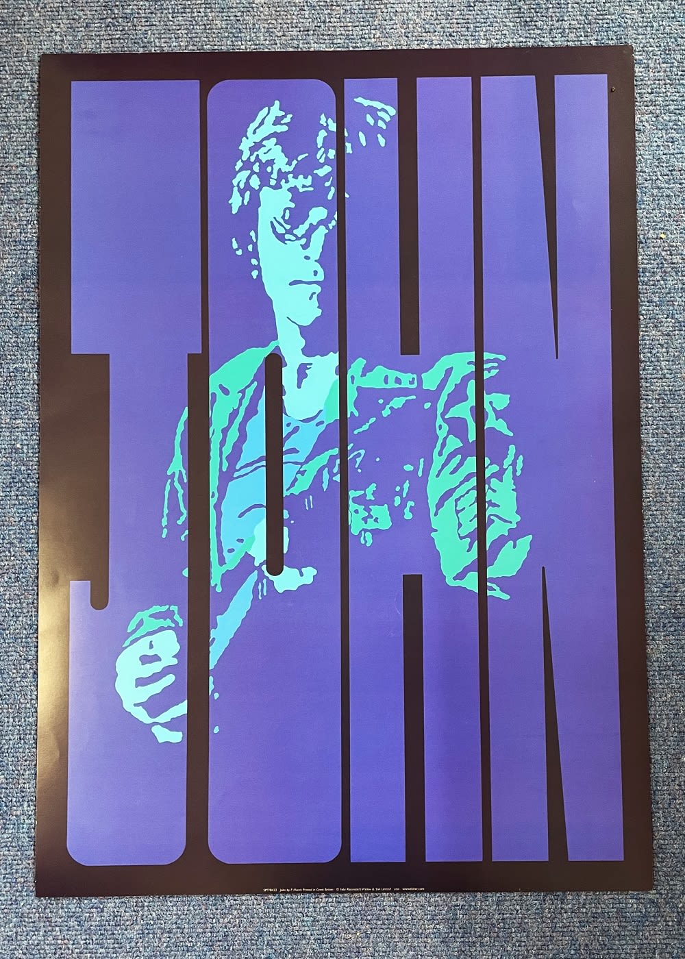 Lot 440: John Lennon 20 x 27 Coloured Print. Good...