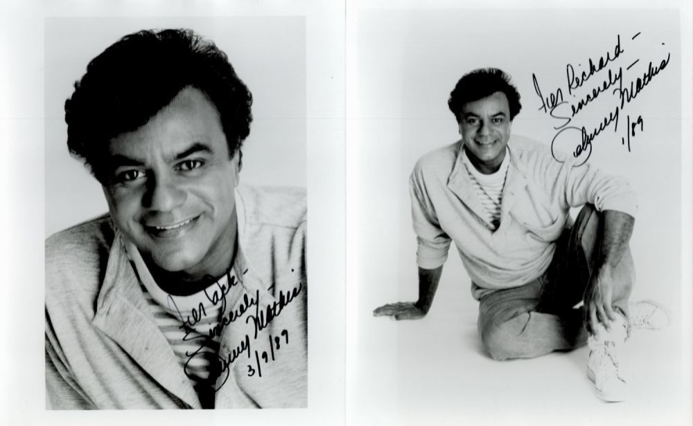 Lot 667: Johnny Mathis Signed 10x8 inch Black and White...