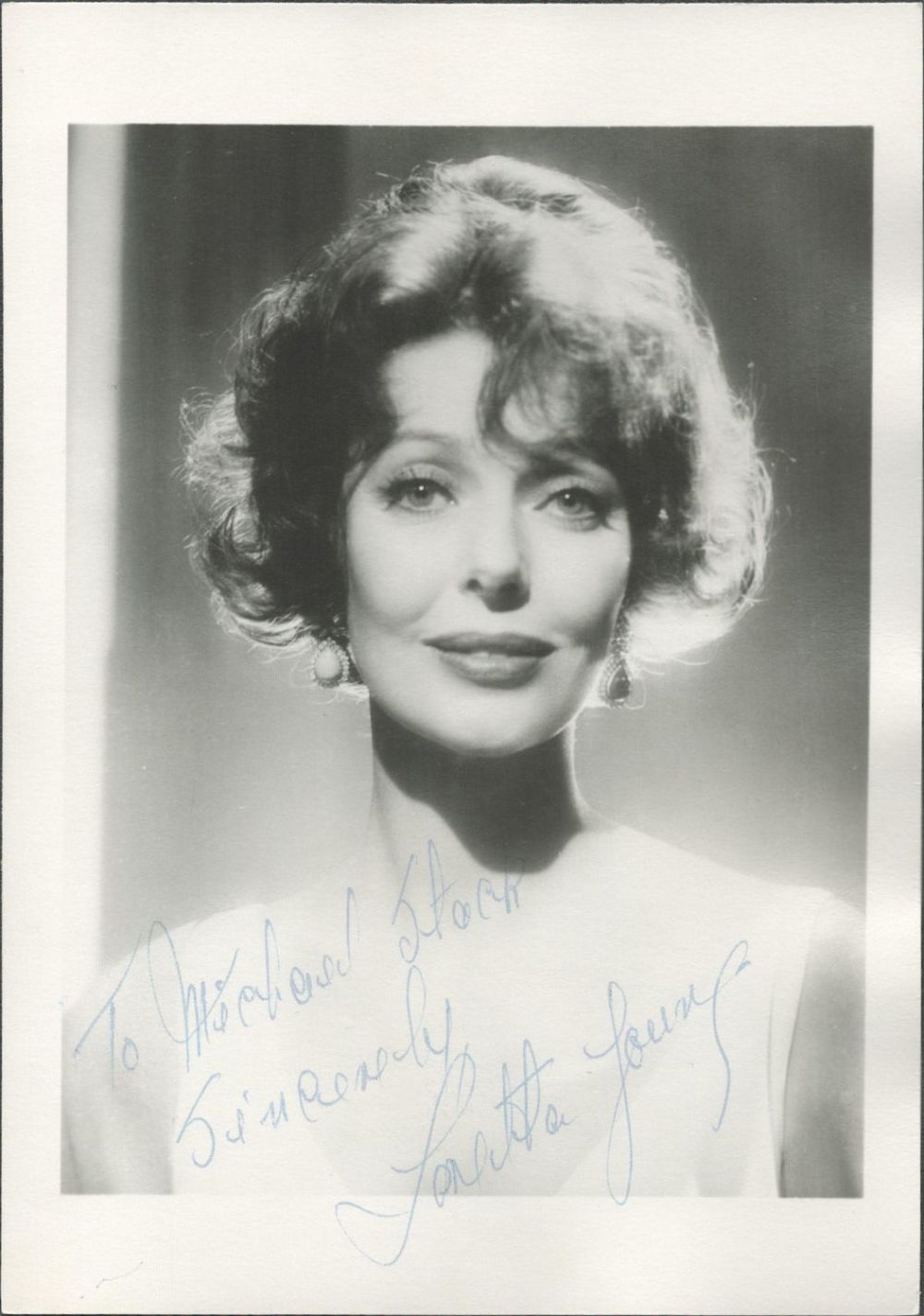 Lot 302: Loretta Young signed 7x5 black and white photo...
