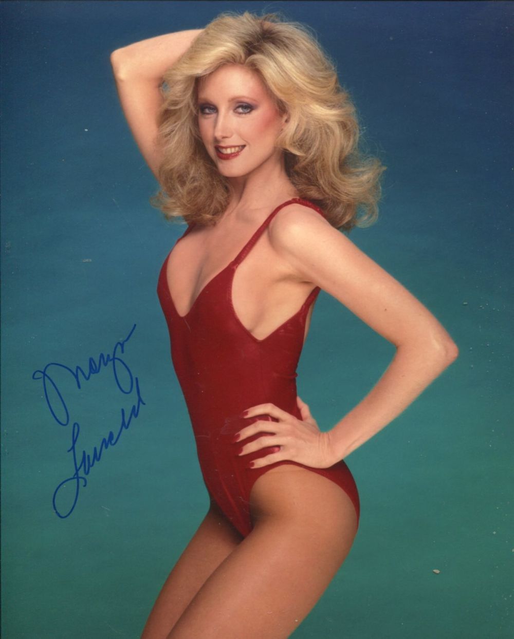 Lot 611: Morgan Fairchild, 8x10 sexy swimsuit photo signed by...