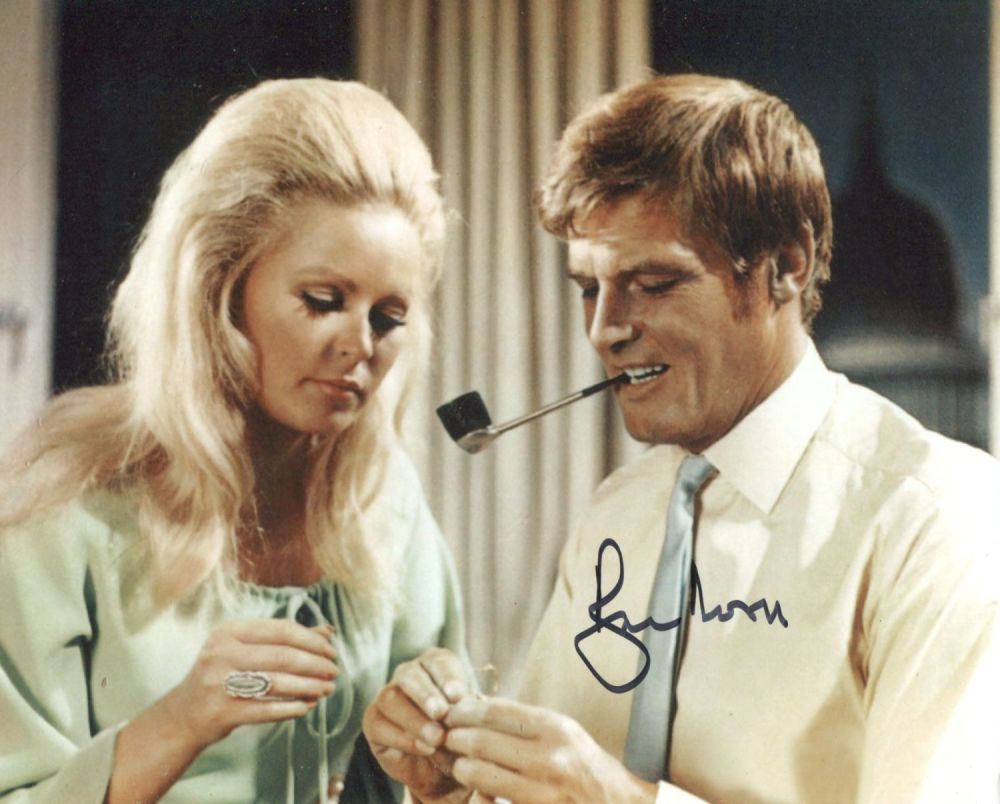 Lot 635: Roger Moore signed 8x10 photo from the TV...