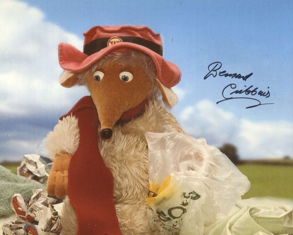 Lot 760: The Wombles. 8x10 photo signed by actor Bernard...