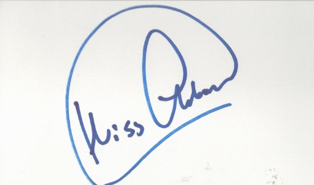 Lot 262: Kriss Akabusi white card (measuring 5"x3") nicely signed...