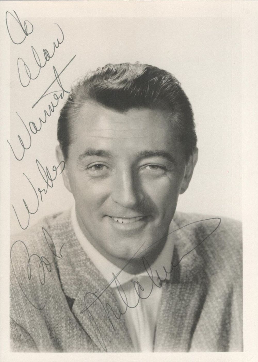 Lot 301: Robert Mitchum signed 7x5 black and white vintage...