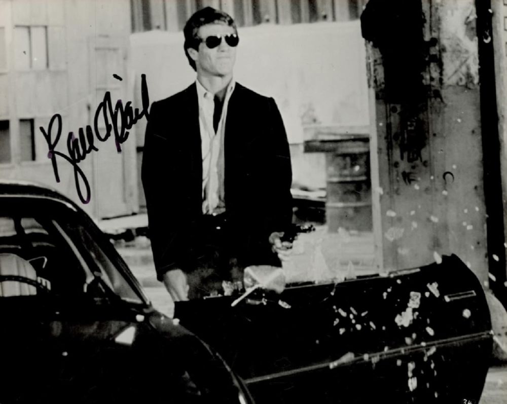Lot 447: Ryan O'Neal signed 10x8 black and white photo...