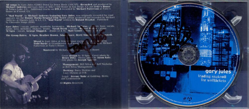 Lot 486: Gary Jules Hand signed CD and Case. Trading...