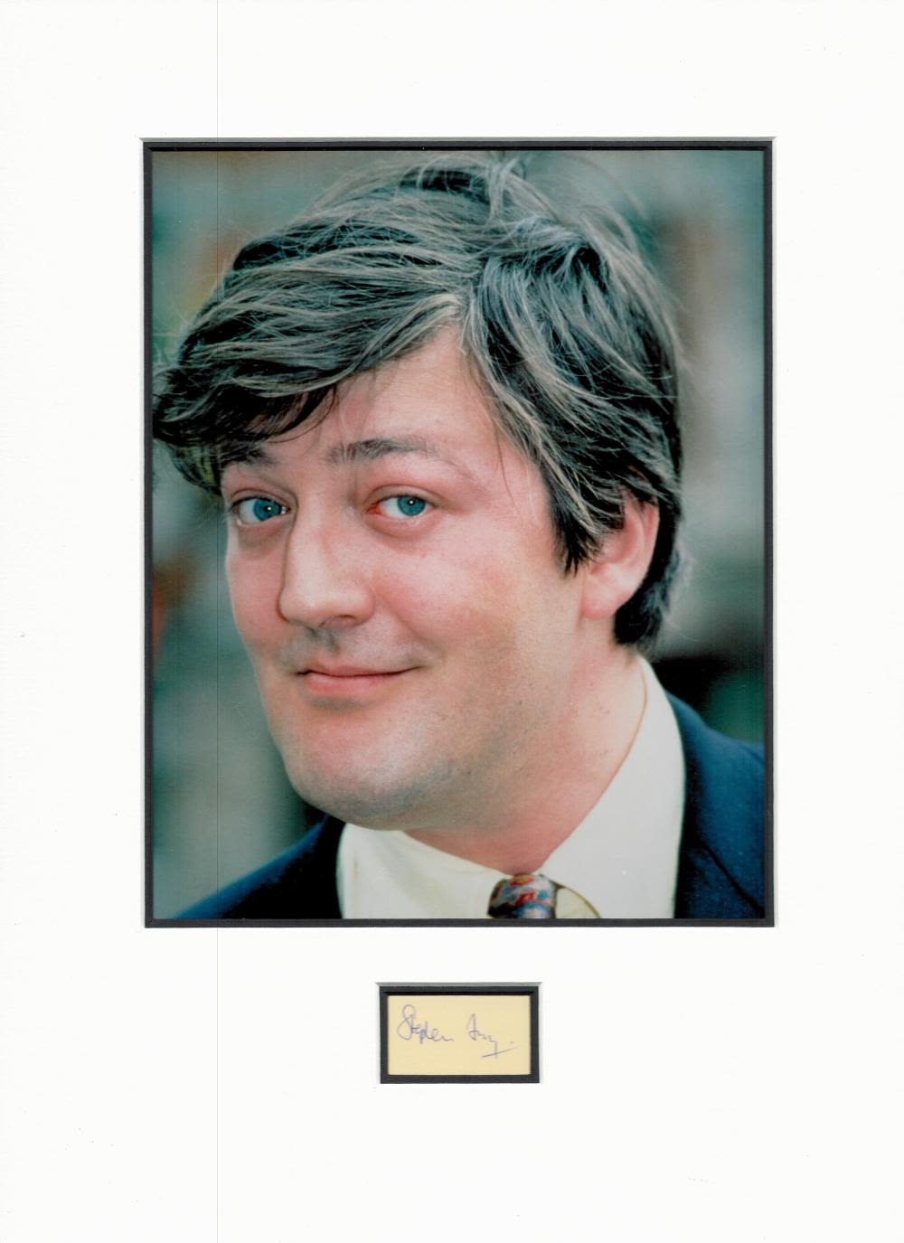 Lot 498: Stephen Fry small signature piece mounted below colour...