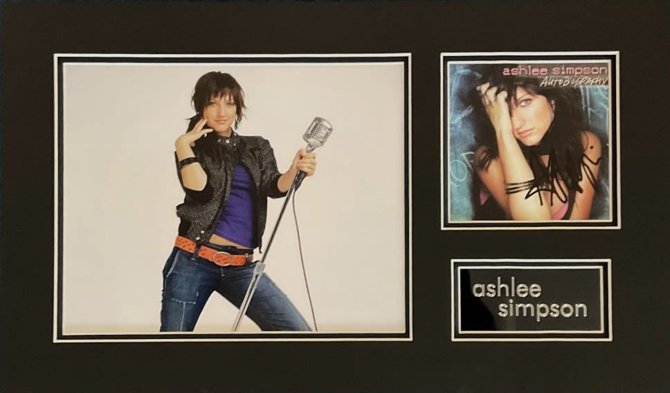 Lot 505: Ashlee Simpson beautifully double matted signature piece displaying...